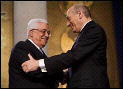 عباس واولمرت يتفقان على على بدء مناقشات حول المسائل الاساسية